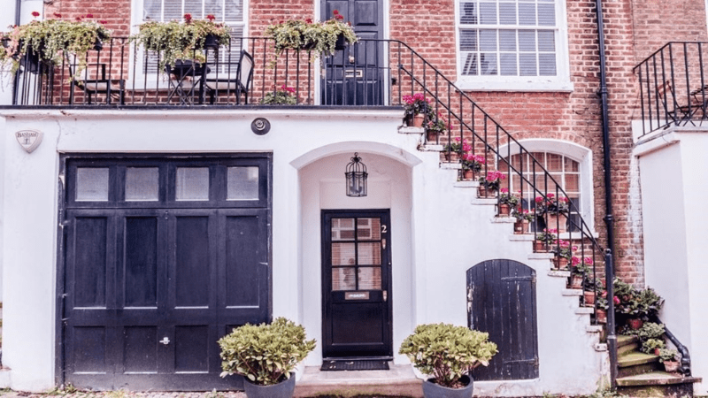 quirky home with decorated front porch area